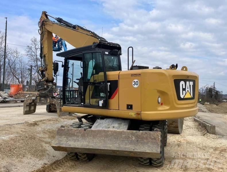 CAT M316F Wielgraafmachines