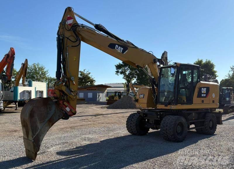 CAT M318F Wielgraafmachines