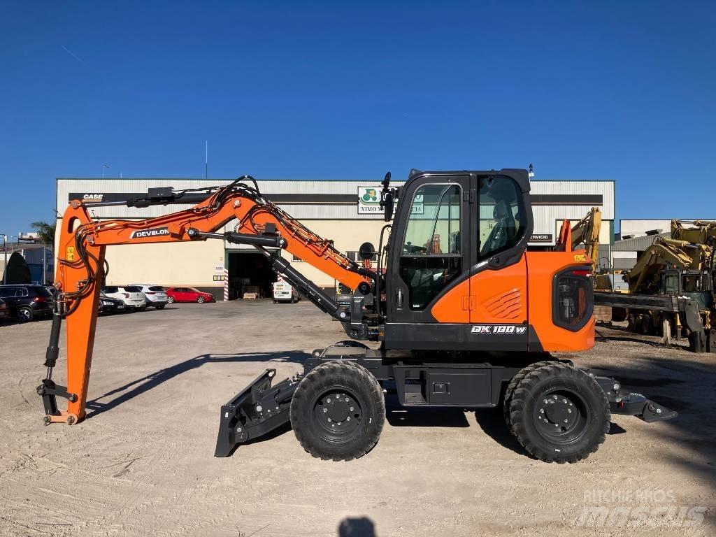 Develon DX 100 W-7 Wielgraafmachines