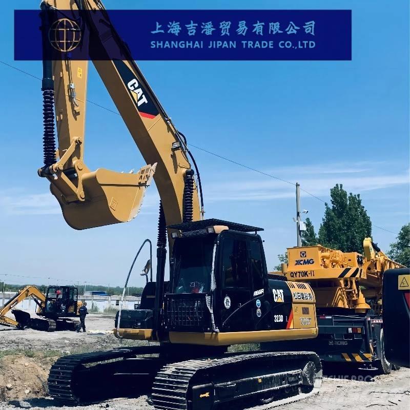 CAT 323 D Rupsgraafmachines