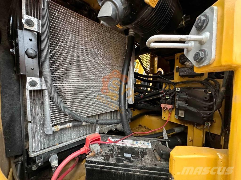 CAT 310 Rupsgraafmachines