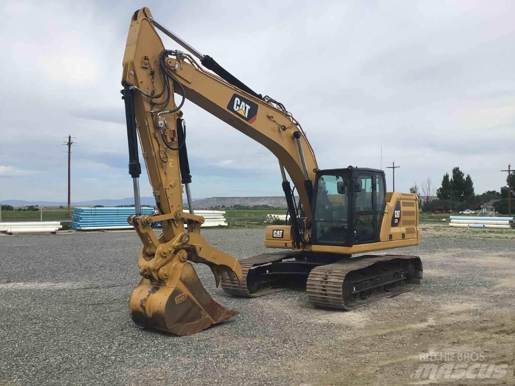 CAT 323 Rupsgraafmachines