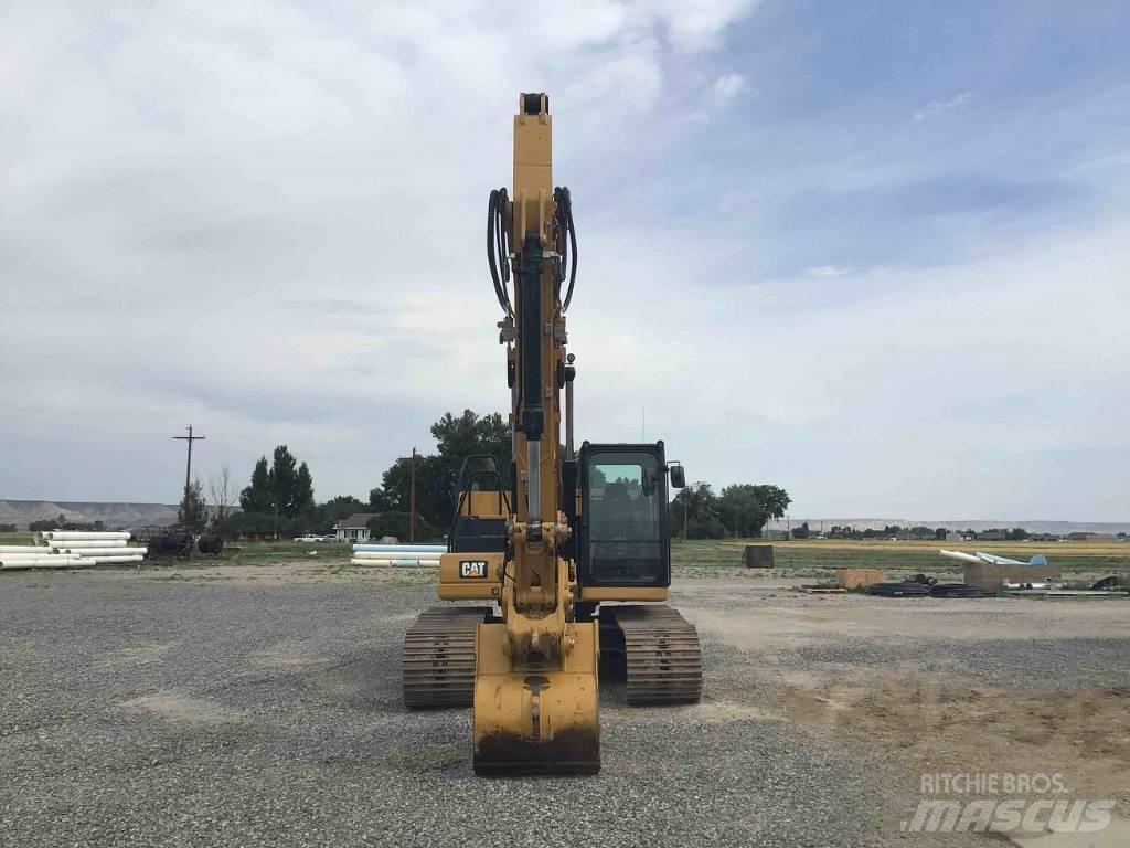 CAT 323 Rupsgraafmachines