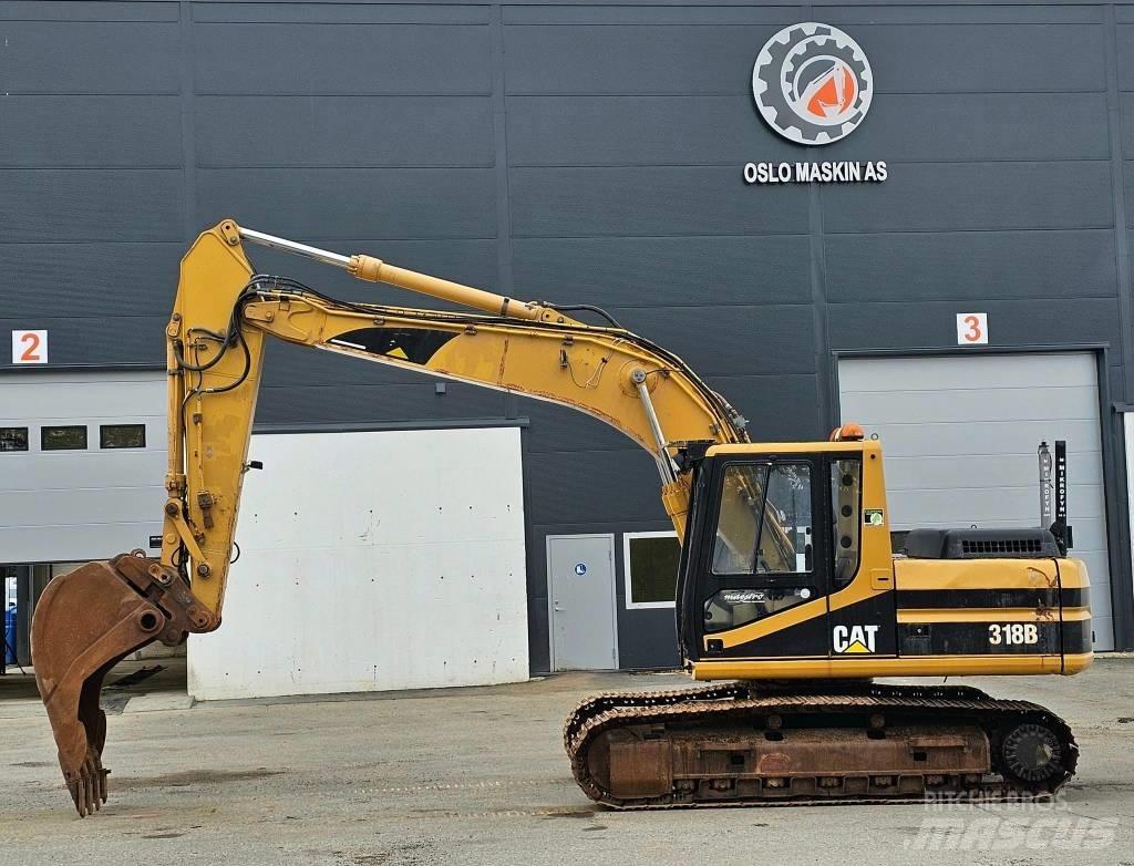 CAT 318 B L Rupsgraafmachines