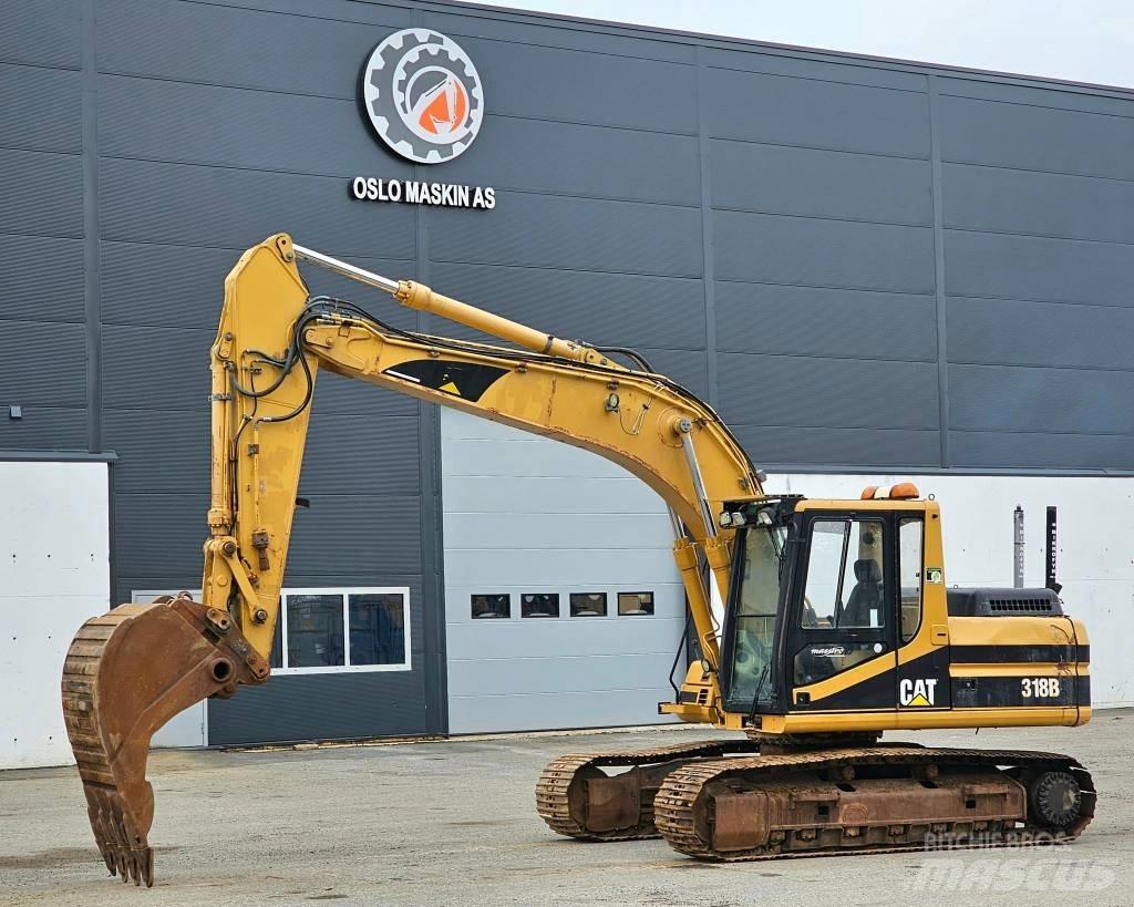 CAT 318 B L Rupsgraafmachines