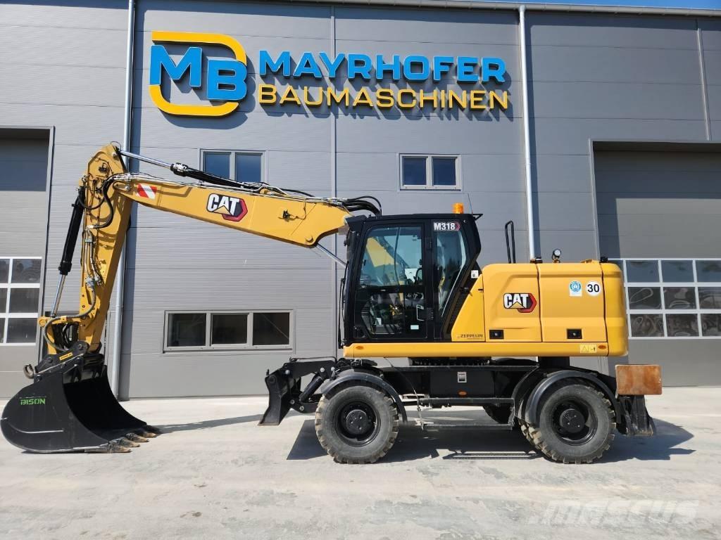 CAT M 318 Wielgraafmachines