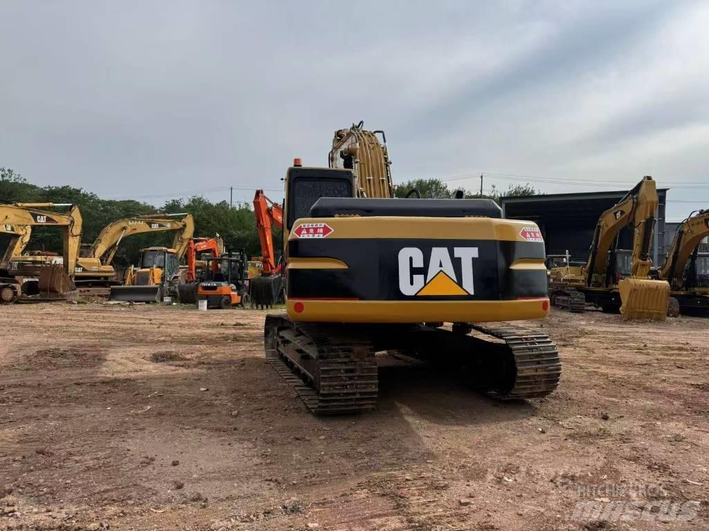 CAT 320 B Rupsgraafmachines