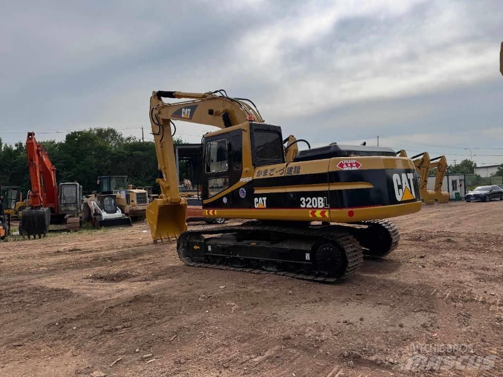 CAT 320 B Rupsgraafmachines