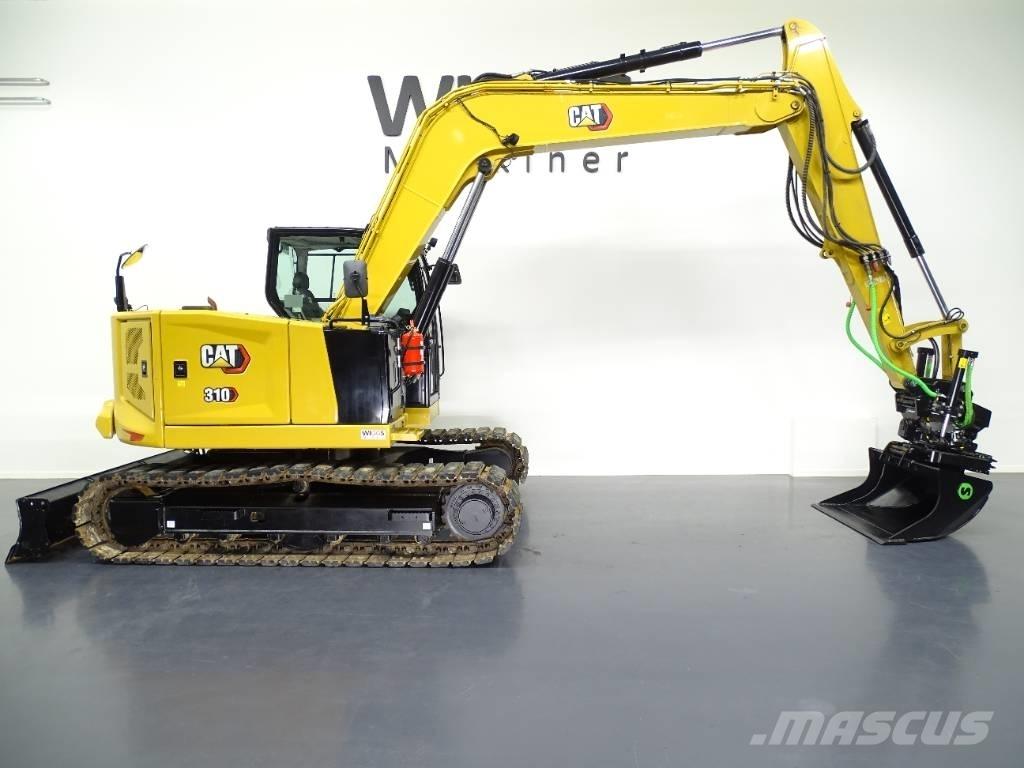 CAT 310 Rupsgraafmachines