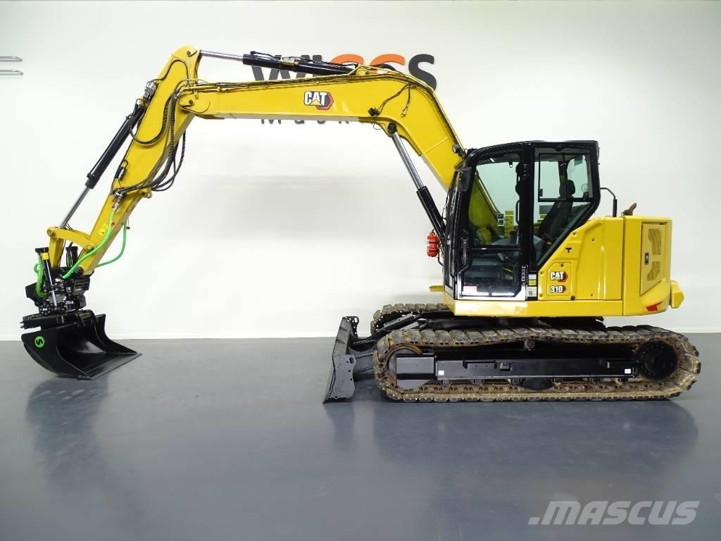 CAT 310 Rupsgraafmachines