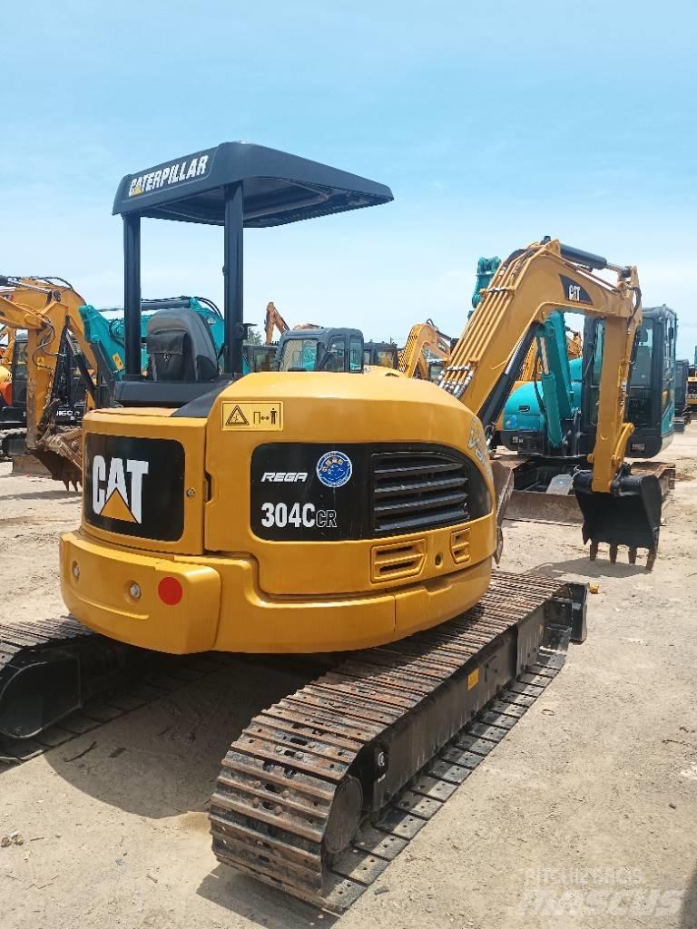 CAT 304 C Rupsgraafmachines