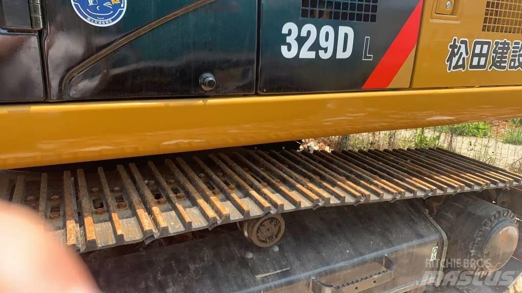 CAT 329 Rupsgraafmachines