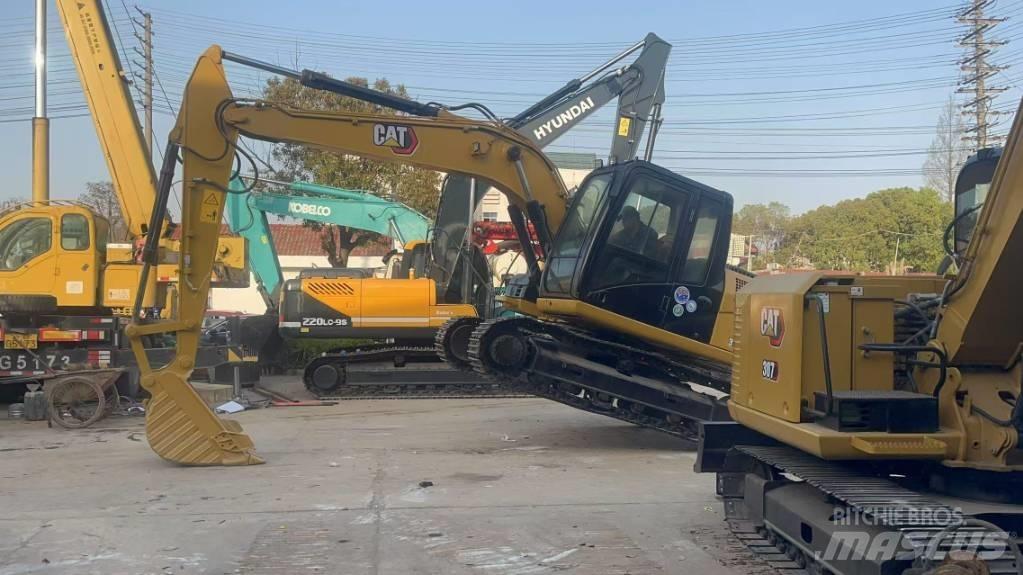 CAT 313 D Rupsgraafmachines