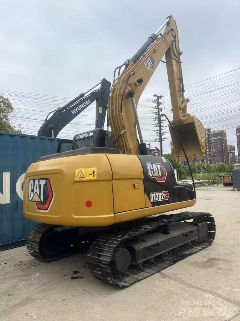 CAT 313 D Rupsgraafmachines