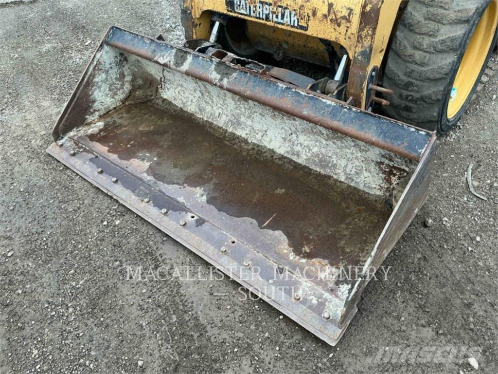 CAT 246C Schrankladers