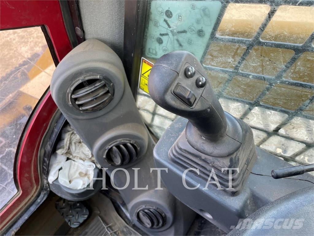 CAT 299D3XE Rupsladers