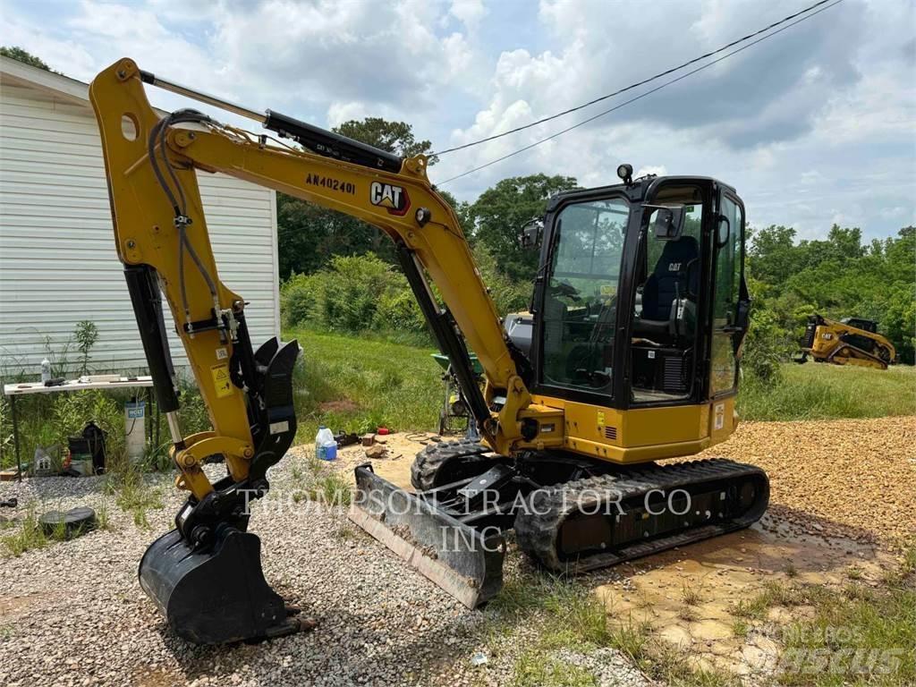 CAT 304 Rupsgraafmachines