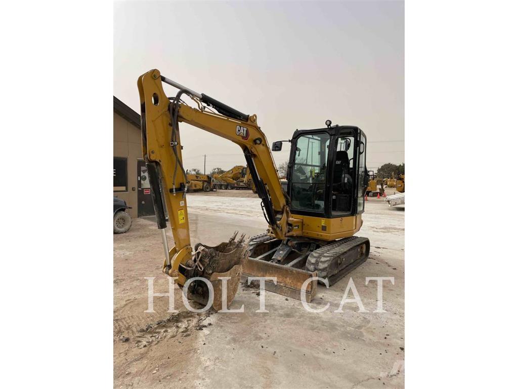 CAT 304 Rupsgraafmachines