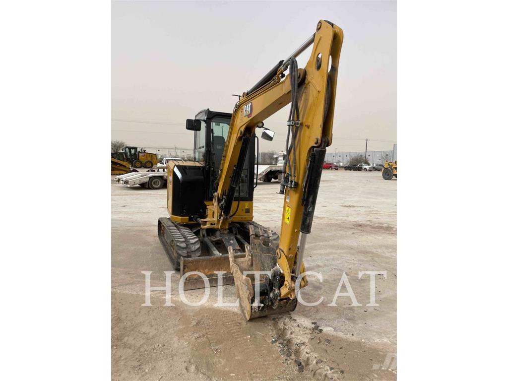 CAT 304 Rupsgraafmachines