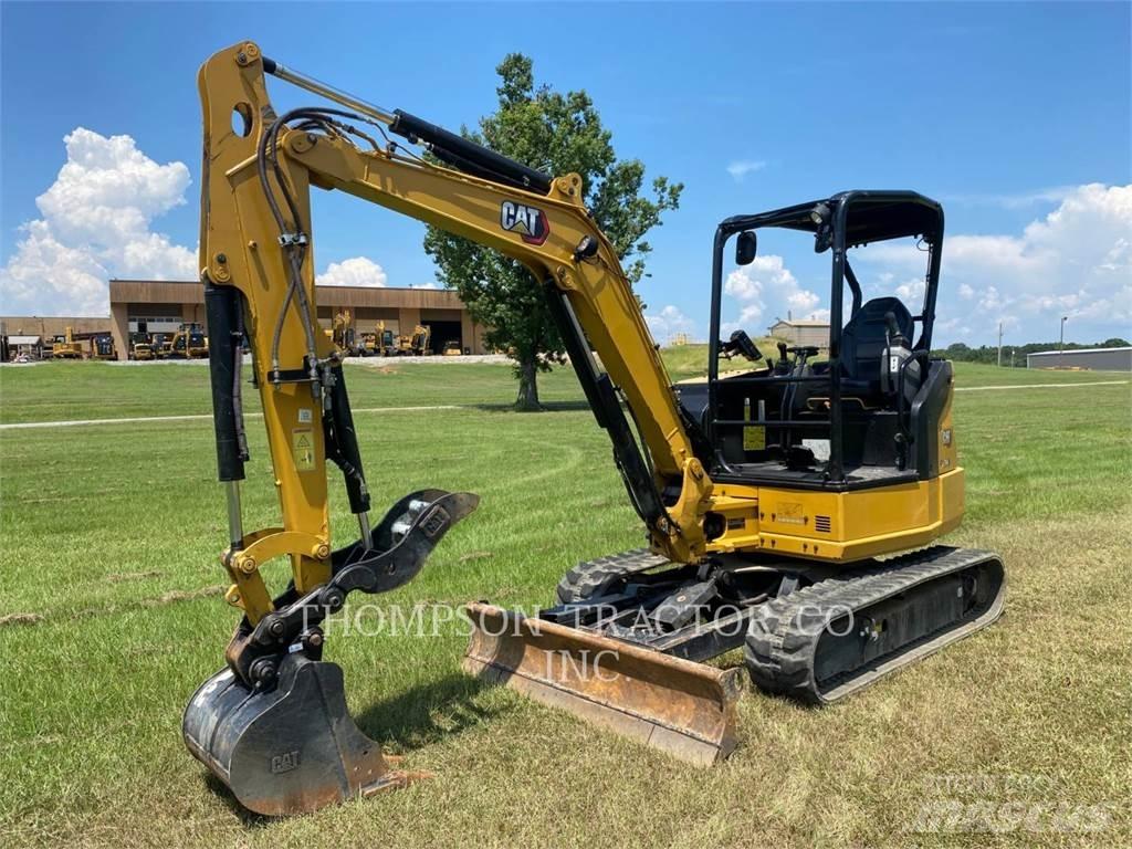 CAT 304 Rupsgraafmachines