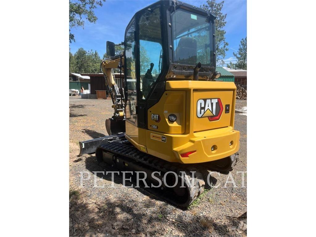 CAT 304 Rupsgraafmachines