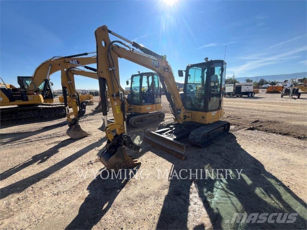 CAT 304 Rupsgraafmachines