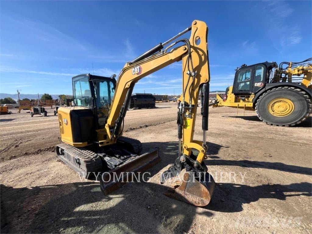 CAT 304 Rupsgraafmachines