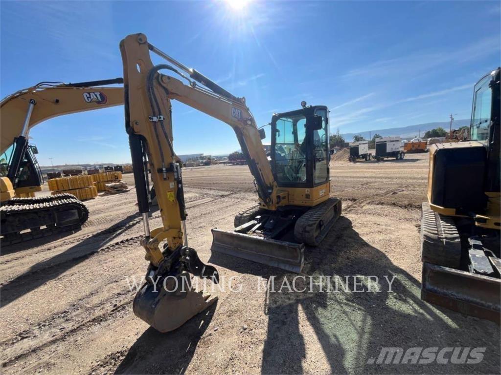 CAT 304 Rupsgraafmachines