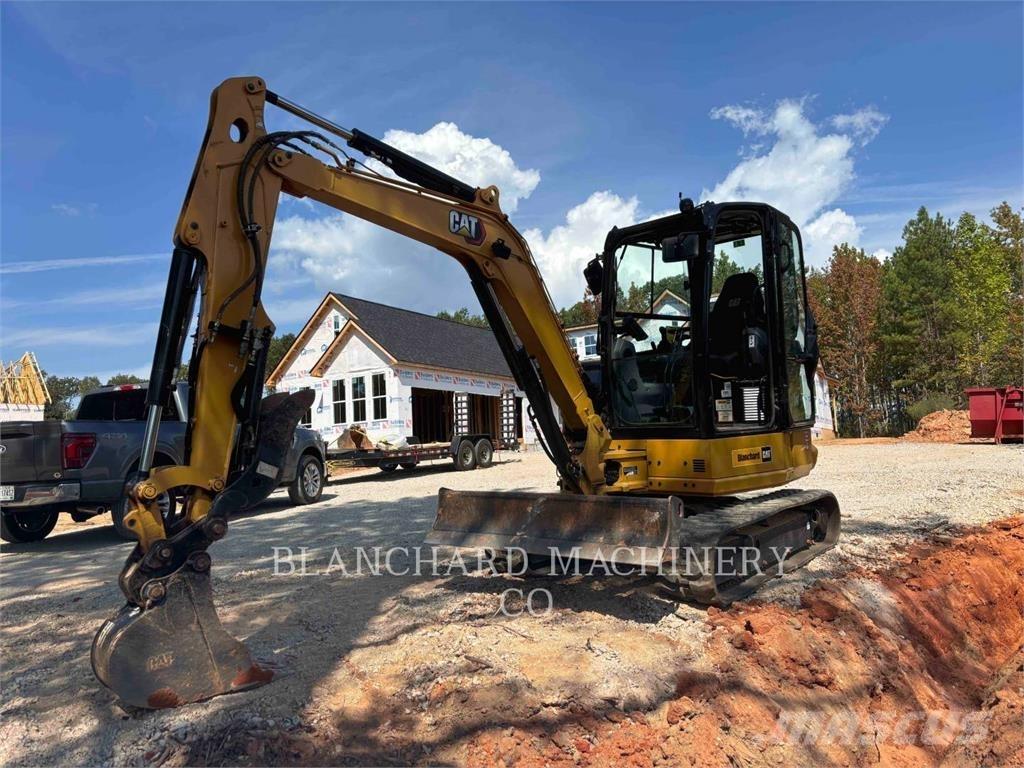 CAT 304 Rupsgraafmachines