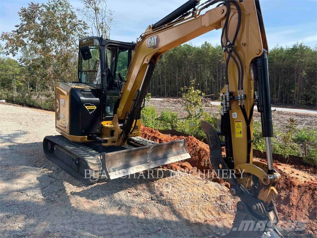 CAT 304 Rupsgraafmachines