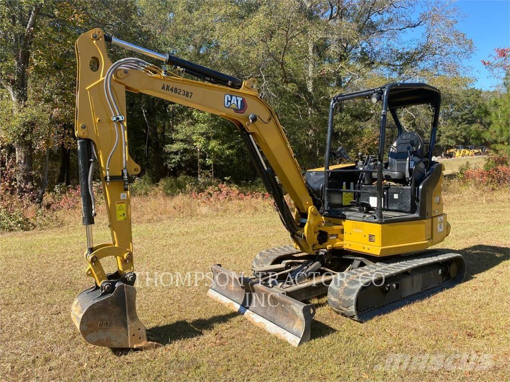 CAT 304 Rupsgraafmachines