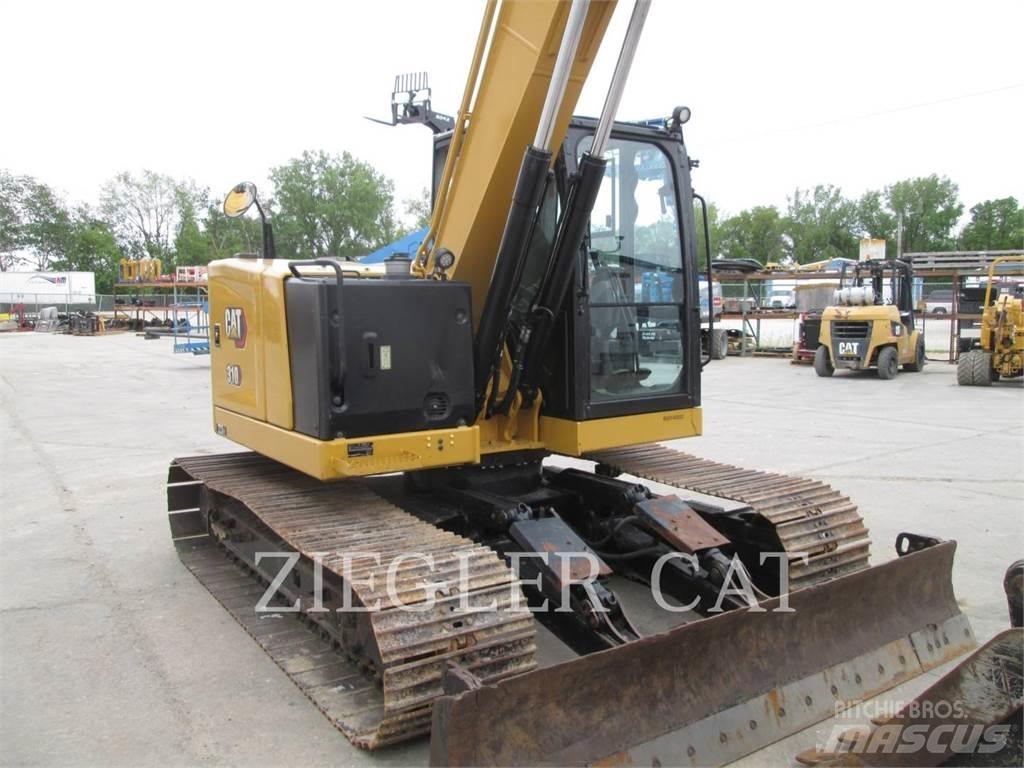 CAT 310 Rupsgraafmachines