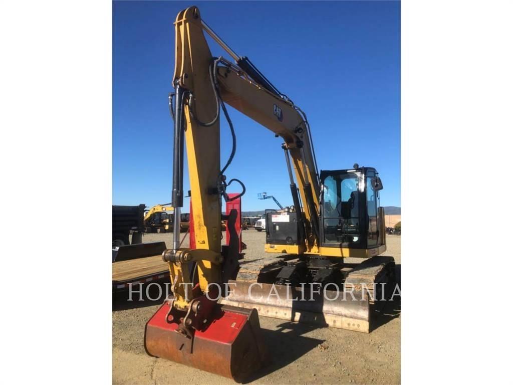 CAT 310 Rupsgraafmachines