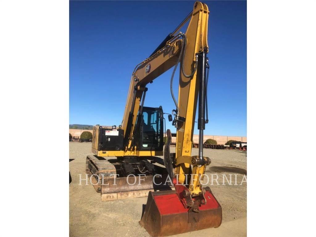 CAT 310 Rupsgraafmachines