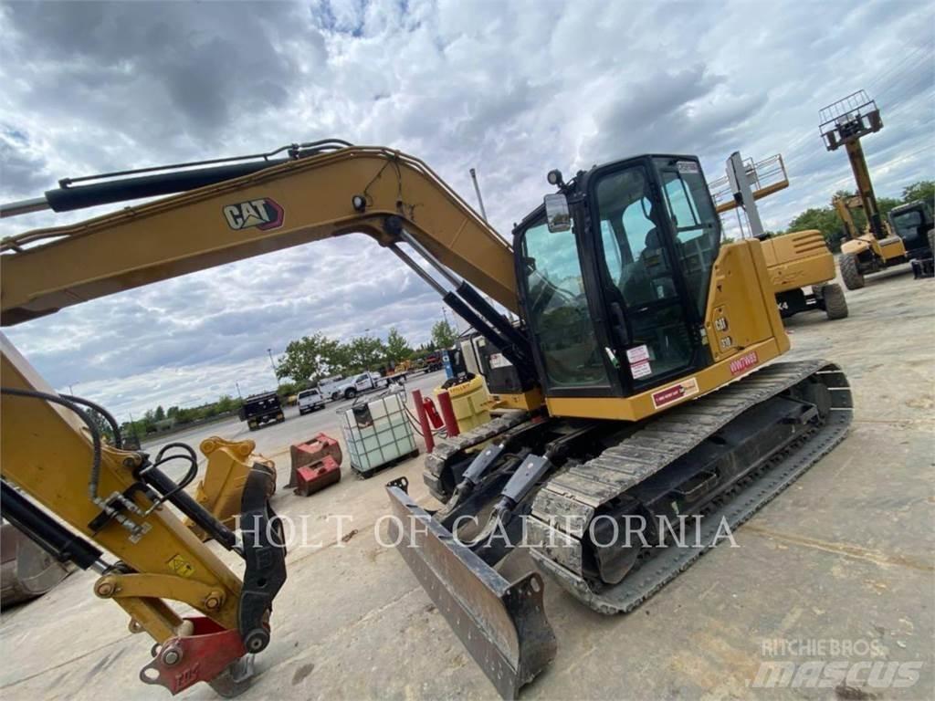 CAT 310 Rupsgraafmachines