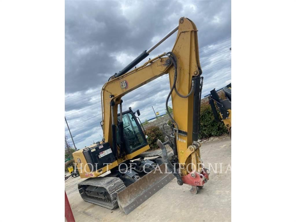 CAT 310 Rupsgraafmachines