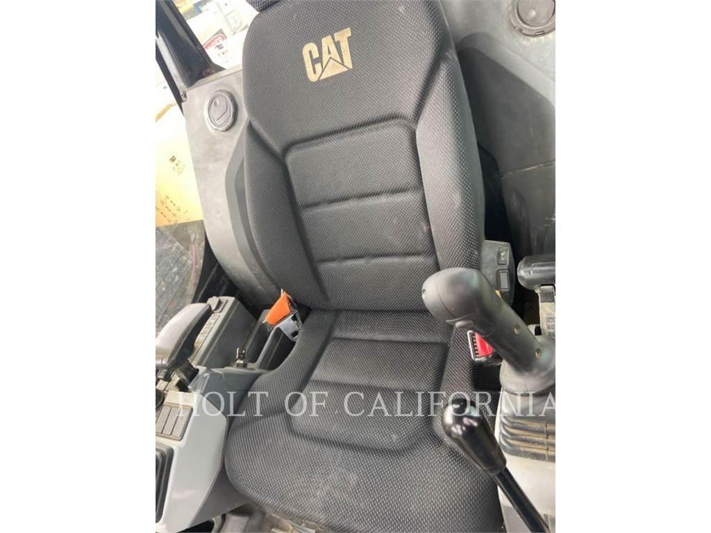 CAT 310 Rupsgraafmachines