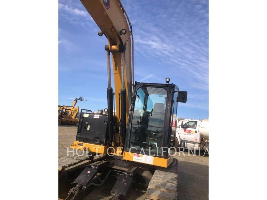 CAT 310 Rupsgraafmachines