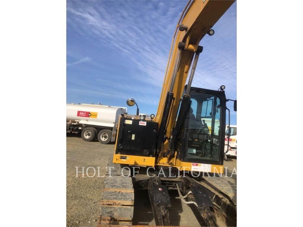CAT 310 Rupsgraafmachines
