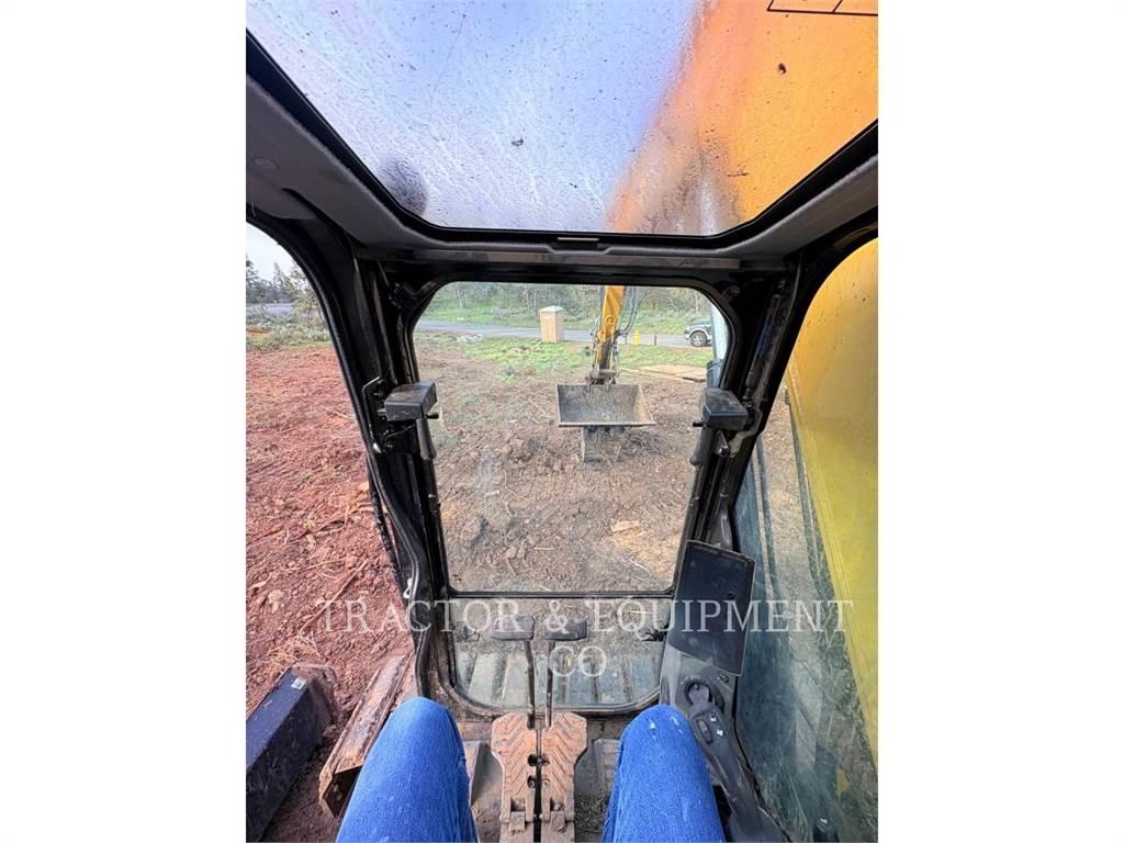 CAT 310 Rupsgraafmachines