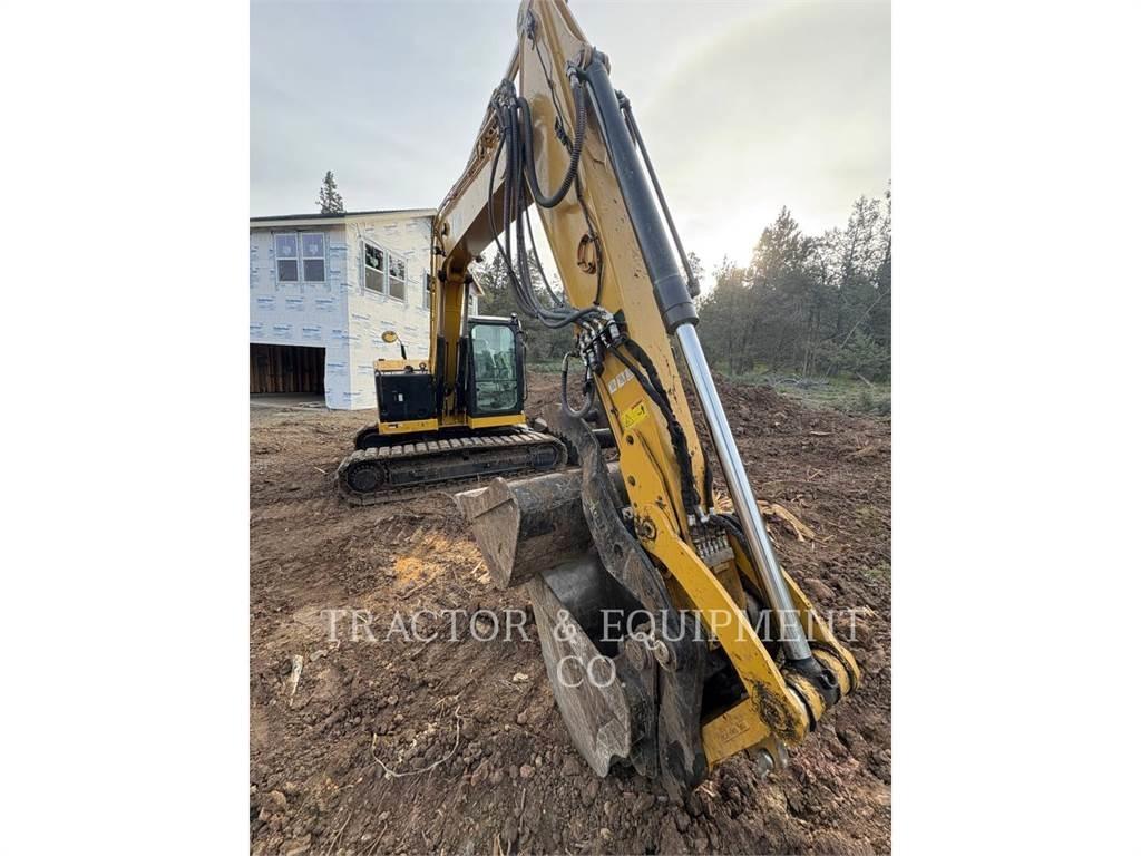 CAT 310 Rupsgraafmachines