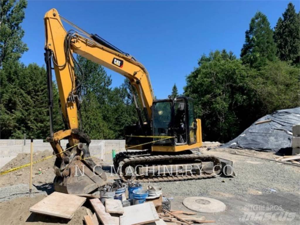 CAT 310 Rupsgraafmachines