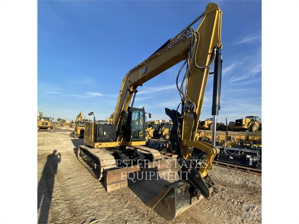 CAT 310 Rupsgraafmachines