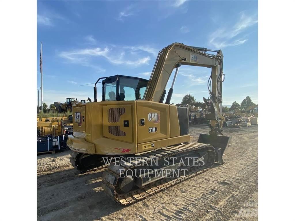 CAT 310 Rupsgraafmachines