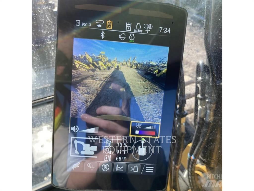 CAT 310 Rupsgraafmachines
