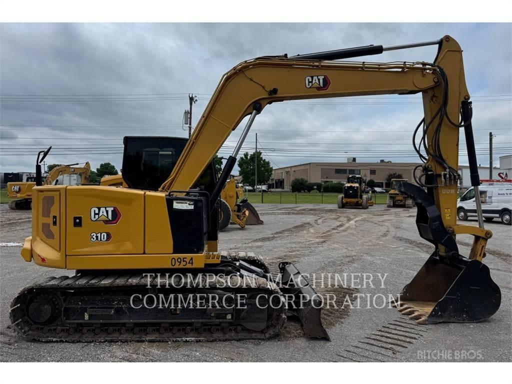CAT 310 Rupsgraafmachines