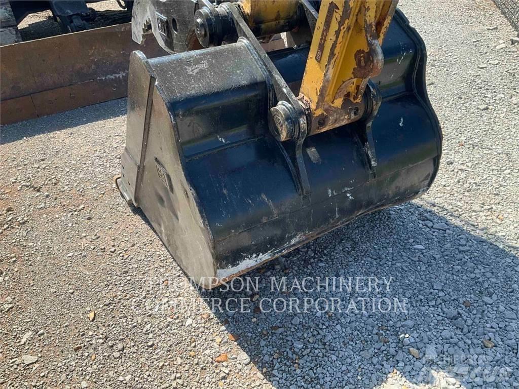 CAT 310 Rupsgraafmachines