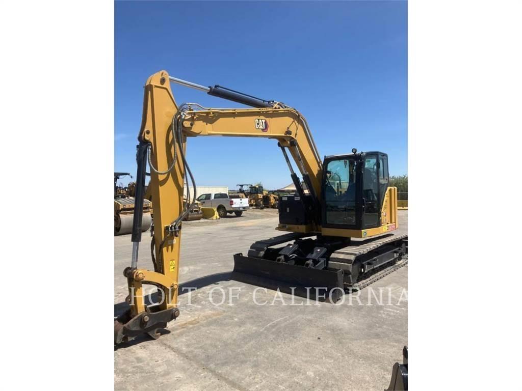 CAT 310 Rupsgraafmachines