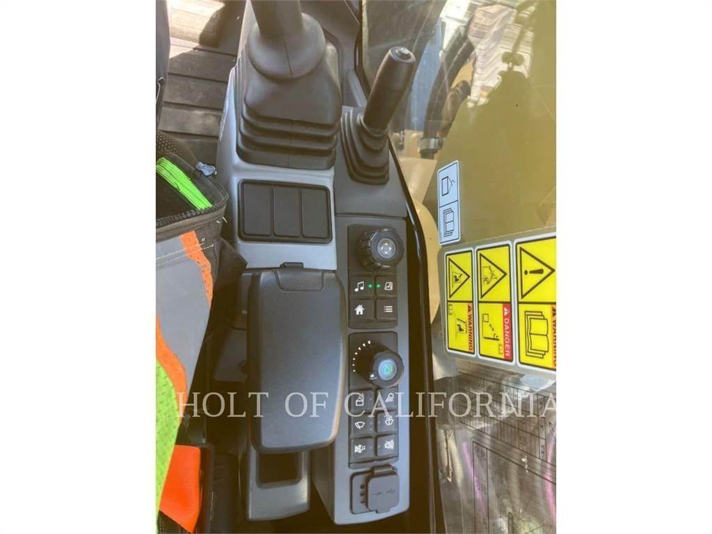 CAT 310 Rupsgraafmachines