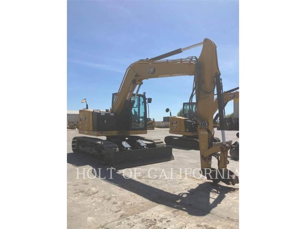 CAT 310 Rupsgraafmachines